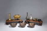 A GROUP OF BRONZE AND METAL WARES
