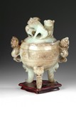 A WELL CARVED MYTHICAL BEASTS JADE TRIPOD CENSER