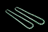 A SET OF TWO NATURAL JADEITE BEAD NECKLACES