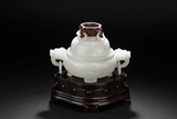 A WHITE JADE TRIPOD CENSER WITH WOODEN FINIAL AND STAND