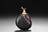 A ZITAN WOOD ROOT CARVED SNUFF BOTTLE