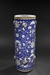 A FAMILLE-ROSE BLUE GROUND SCROLL POT
