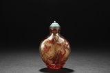 A RED-OVERLAY GLASS SNUFF BOTTLE WITH TURQUOISE STOPPER
