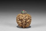 A WALNUT-SHELL CARVED 'LUOHAN' SNUFF BOTTLE