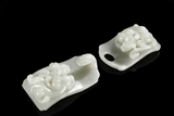 A PAIR OF WHITE JADE 'CHILONG' BELT BUCKLES