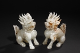 A PAIR OF HETIAN WHITE JADE CARVED QILIN