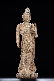 A STONE CARVED STANDING BODHISATTVA FIGURE