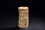 A CARVED IVORY BRUSHPOT