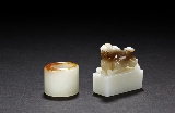 A SET OF WHITE JADE ARCHER'S RING AND SEAL