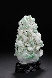 A JADEITE BOULDER OF MAGPIE AND PEACHES