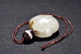 A WHITE JADE 'TOAD' PENDANT