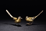 A PAIR OF BRONZE MAGPIES