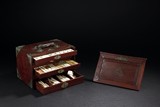 A SET OF IVORY AND BAMBOO MAHJONG AND HARDWOOD CABINET