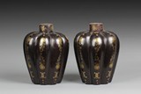 A PAIR OF MELON FORM LACQUER BOTTLES WITH COVERS