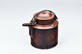 A YIXING RED CLAY TEAPOT WITH HANDLE