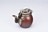 SONG TING: A YIXING RED CLAY TEAPOT WITH HANDLES