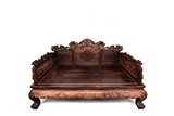 A MAGNIFICENT HUALI WOOD CARVED 'DRAGON' LUOHAN BED
