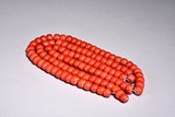 A CORAL-LIKE BEADED NECKLACE