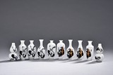 A GROUP OF SMALL CERAMIC BOTTLES