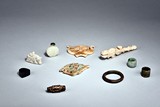 A GROUP OF JADE ORNAMENTS 