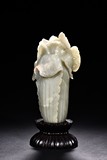 A WHITE JADE CARVED CABBAGE