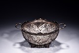 A DUTCH SILVER TWO HANDLED BOWL WITH GLASS LINER