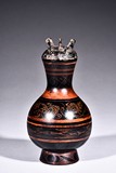 A WOOD LACQUER PAINTED VASE