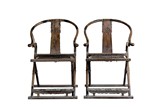 A PAIR OF HARDWOOD FOLDING CHAIRS