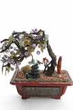 A CINNABAR LACQUER JARDINIERE WITH PRECIOUS GEM TREE AND CARVINGS