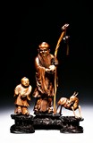 A HUANGYANGMU CARVED FIGURAL GROUP