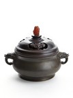 A BRONZE ELEPHANT HANDLE CENSER WITH AGATE FINIAL 