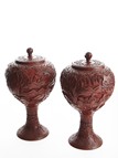 A PAIR OF CINNABAR LACQUER VASES AND COVER