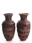 A PAIR OF CINNABAR LACQUER 'FIGURES' VASES 