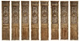 A SET OF EIGHT WOOD CARVED DOOR PANELS 