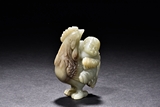 A CELADON JADE 'CHILD AND ROOSTER'