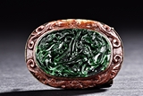 A SPINACH JADE CARVED BROOCH
