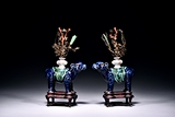 A PAIR OF BLUE GLAZED MYTHICAL BEAST SUPPORTING VASE