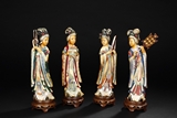 A SET OF FOUR PAINTED IVORY FIGURES OF BEAUTIES