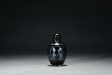 A BLACK LACQUERED MOTHER-OF-PEARL SNUFF BOTTLE