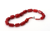 A RED CORAL CARVED NECKLACE