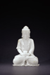 A WHITE JADE CARVED FIGURE OF BUDDHA