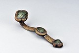 A BRONZE RUYI SCEPTER INSET WITH SPINACH JADE