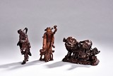 A SET OF THREE HARDWOOD AND BAMBOO CARVINGS