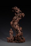 AN AGARWOOD CARVING OF IMMORTAL AND GNARLED TREE