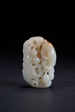 A WHITE JADE CARVING OF SQUIRREL AND GRAPES