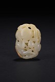 A WHITE JADE CARVING OF MONKEY AND PEACH