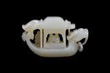 A WHITE JADE CARVING OF DRAGON BOAT