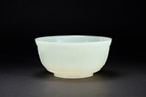 A CARVED WHITE JADE BOWL