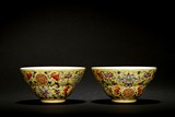 A PAIR OF FAMILLE ROSE YELLOW GLAZED 'SHOU' BOWLS