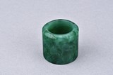 A SPINACH JADE ARCHER'S RING